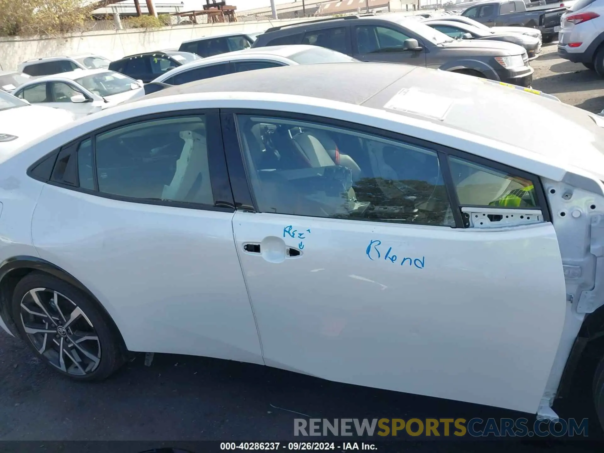14 Photograph of a damaged car JTDACACU2P3000896 TOYOTA PRIUS PRIME 2023
