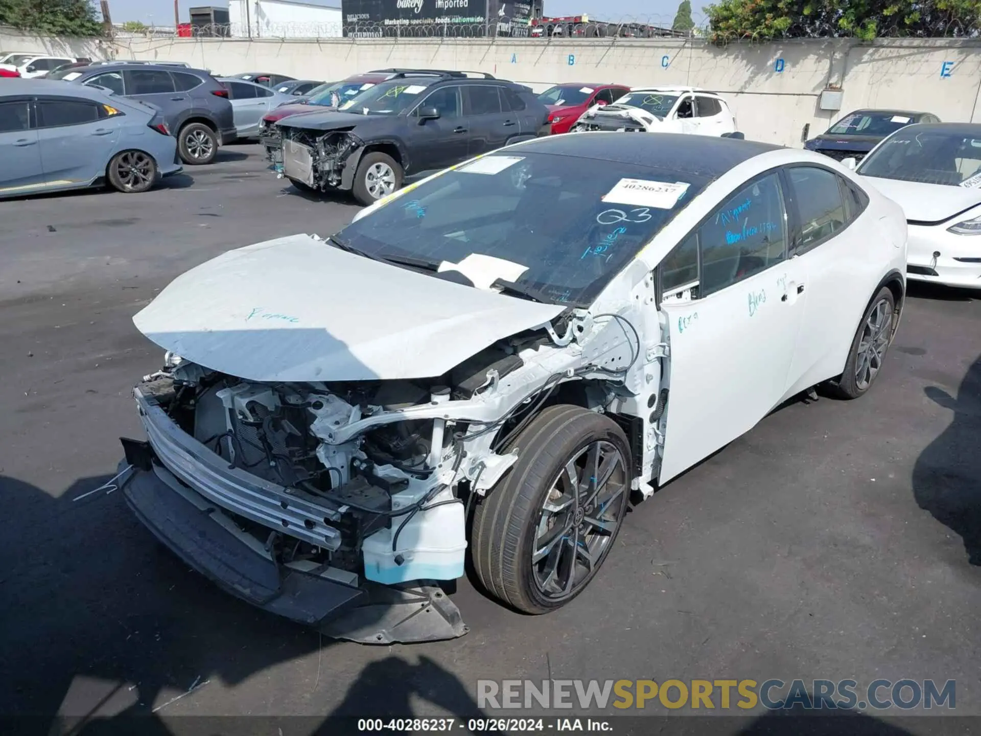 2 Photograph of a damaged car JTDACACU2P3000896 TOYOTA PRIUS PRIME 2023