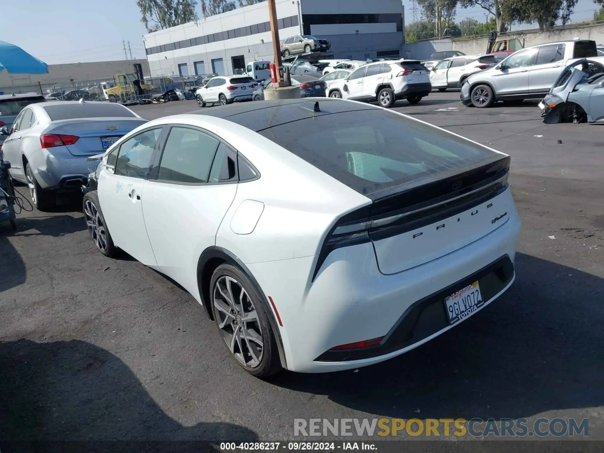 3 Photograph of a damaged car JTDACACU2P3000896 TOYOTA PRIUS PRIME 2023