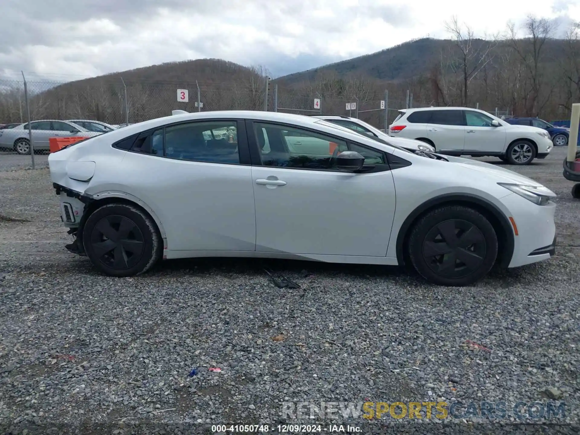 13 Photograph of a damaged car JTDACACUXP3004064 TOYOTA PRIUS PRIME 2023