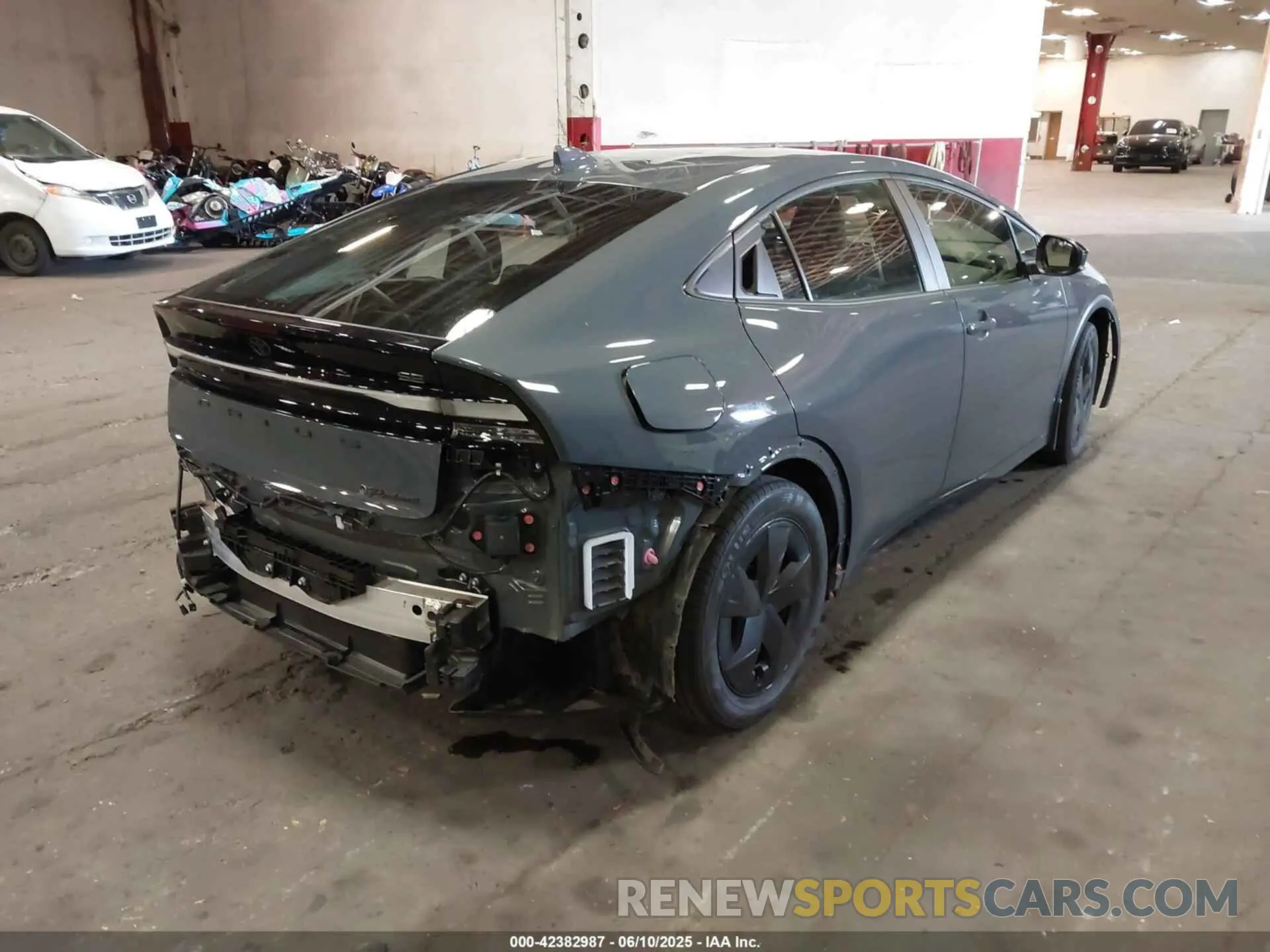 4 Photograph of a damaged car JTDACACU0R3022382 TOYOTA PRIUS PRIME 2024
