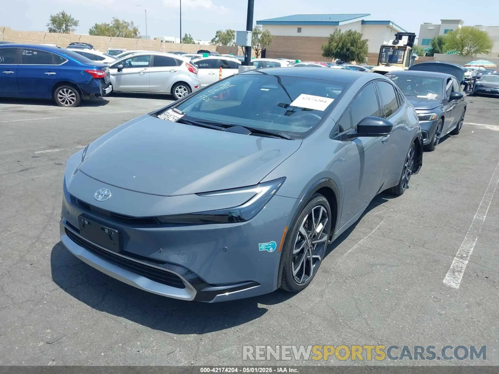 2 Photograph of a damaged car JTDACACU1R3033326 TOYOTA PRIUS PRIME 2024