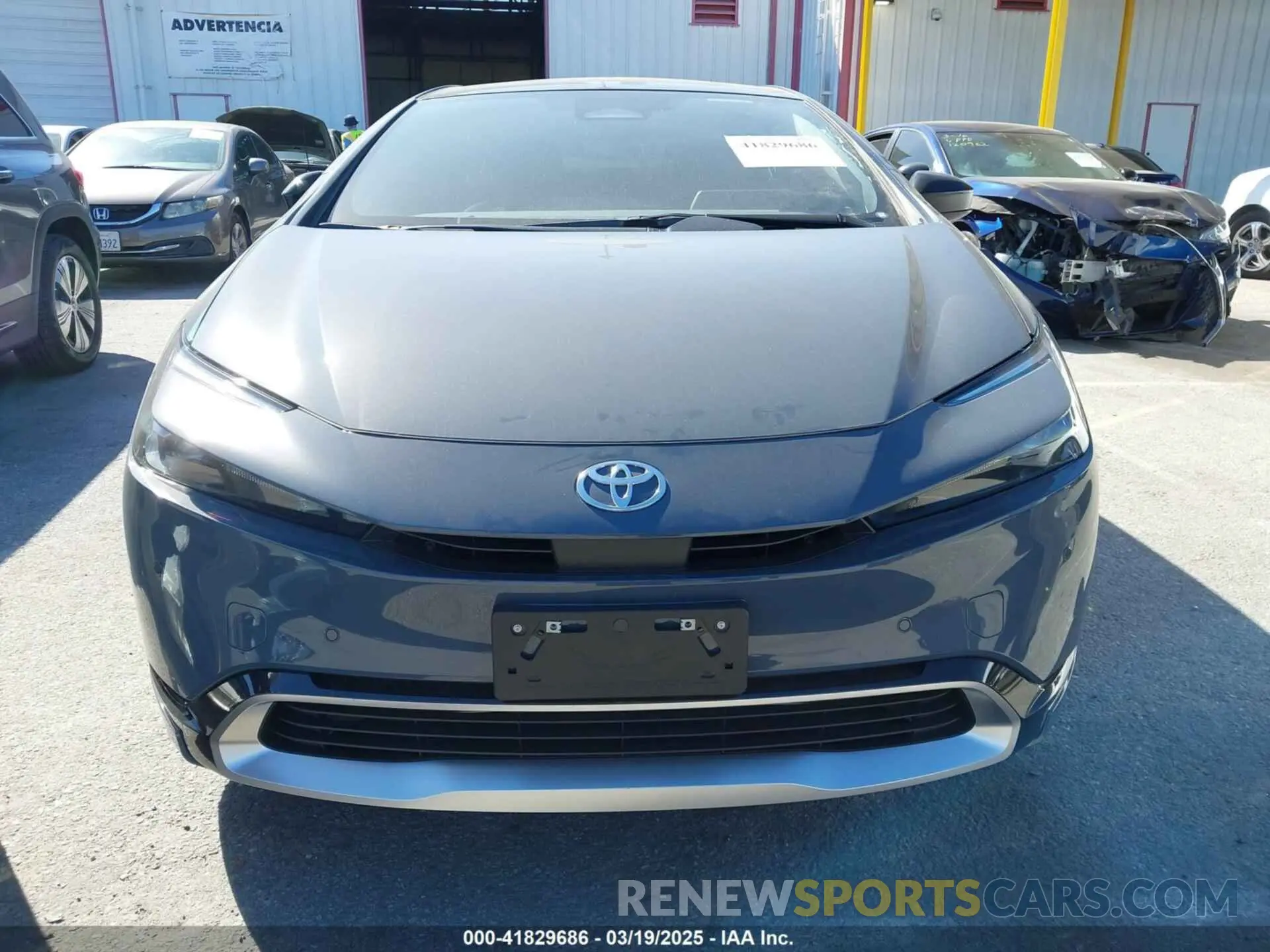 12 Photograph of a damaged car JTDACACU1R3037005 TOYOTA PRIUS PRIME 2024