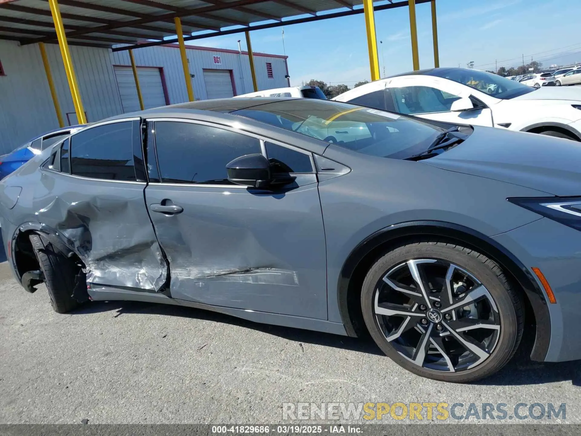 13 Photograph of a damaged car JTDACACU1R3037005 TOYOTA PRIUS PRIME 2024
