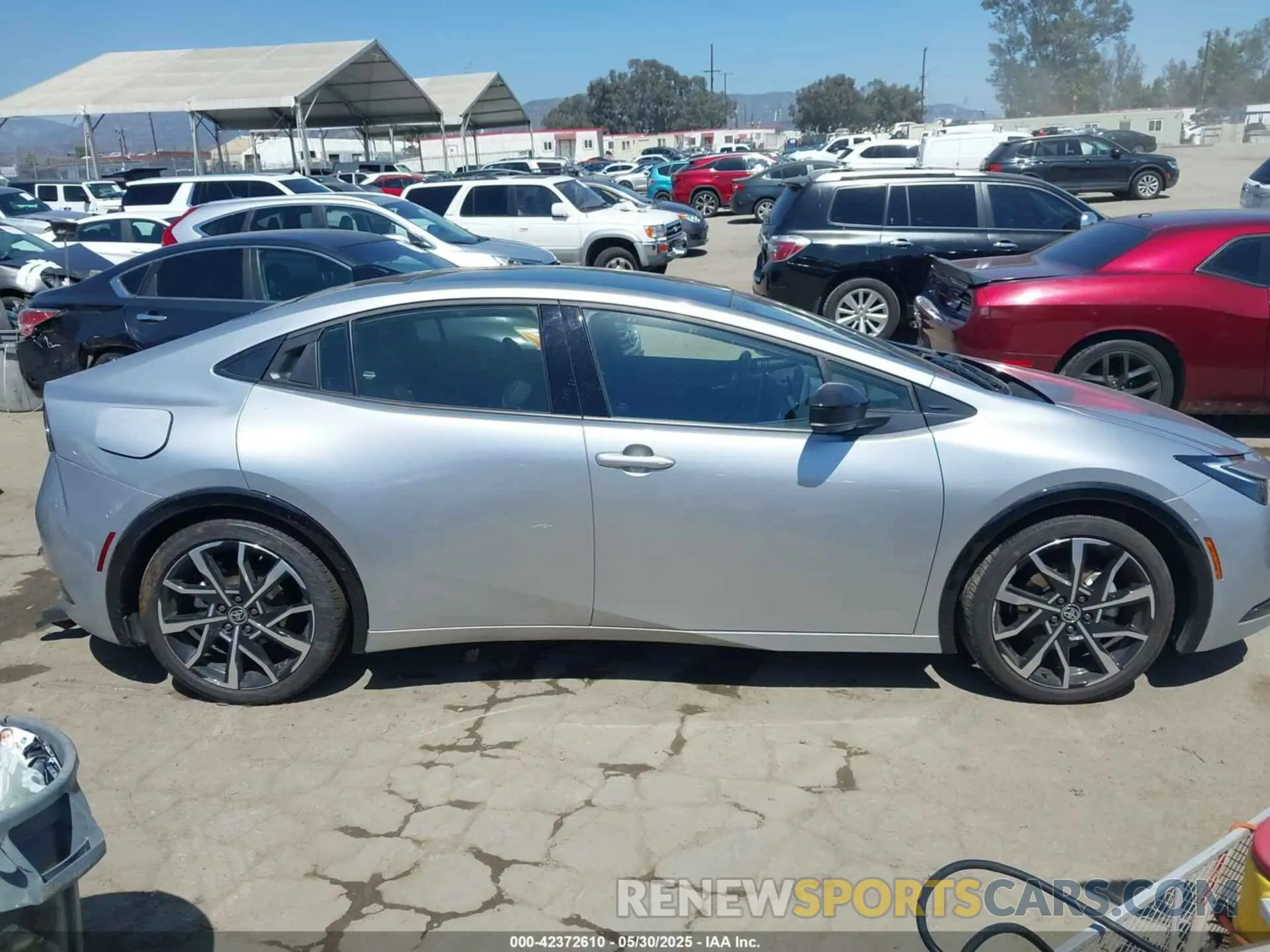 13 Photograph of a damaged car JTDACACU2R3029530 TOYOTA PRIUS PRIME 2024