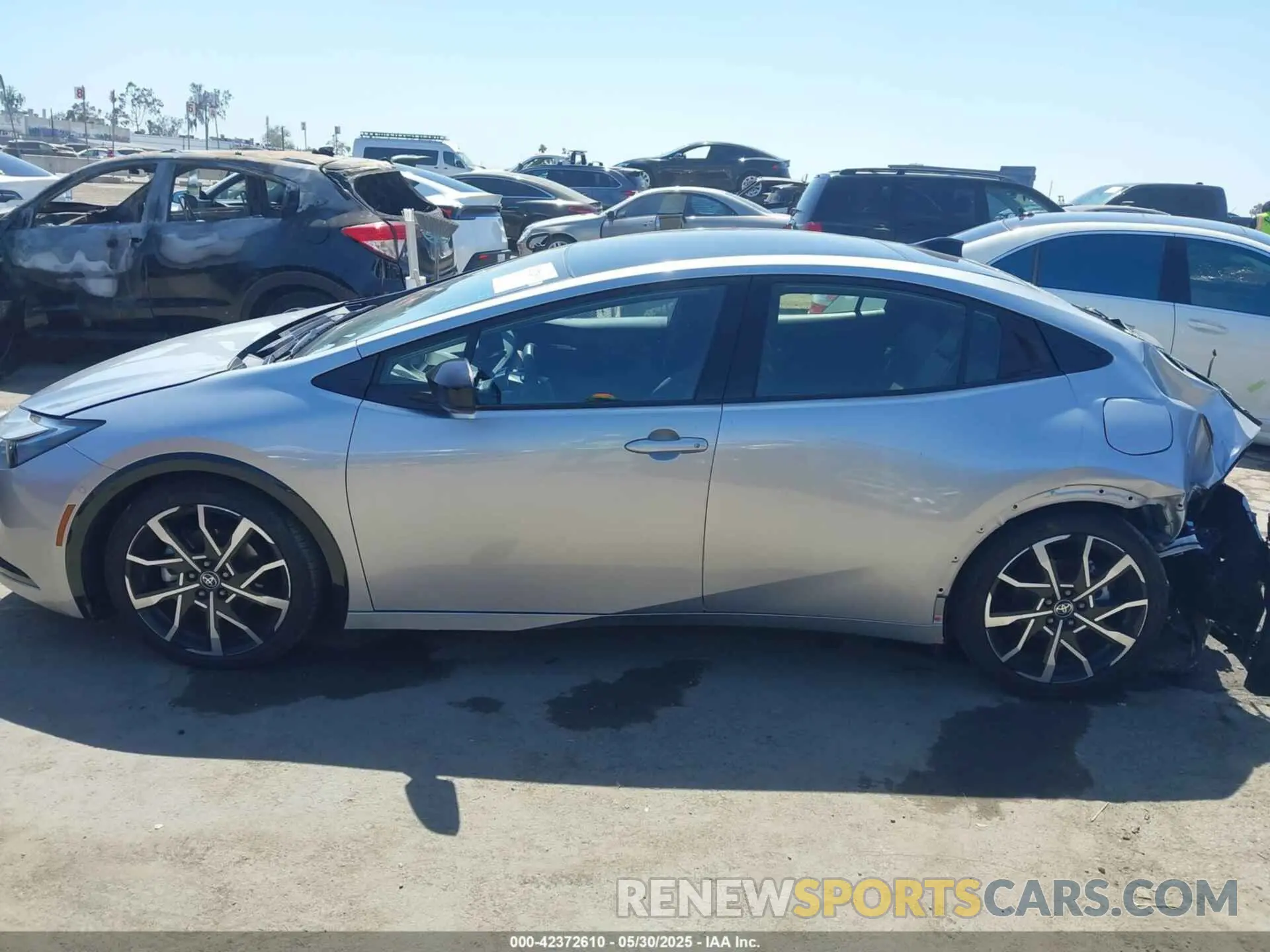 14 Photograph of a damaged car JTDACACU2R3029530 TOYOTA PRIUS PRIME 2024
