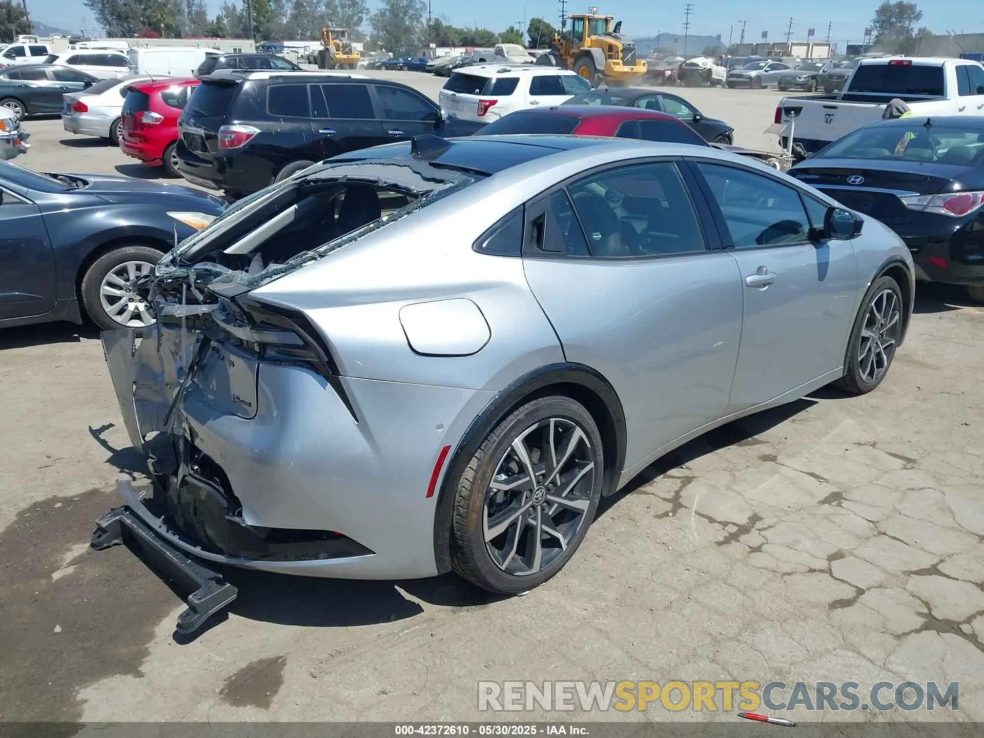 4 Photograph of a damaged car JTDACACU2R3029530 TOYOTA PRIUS PRIME 2024