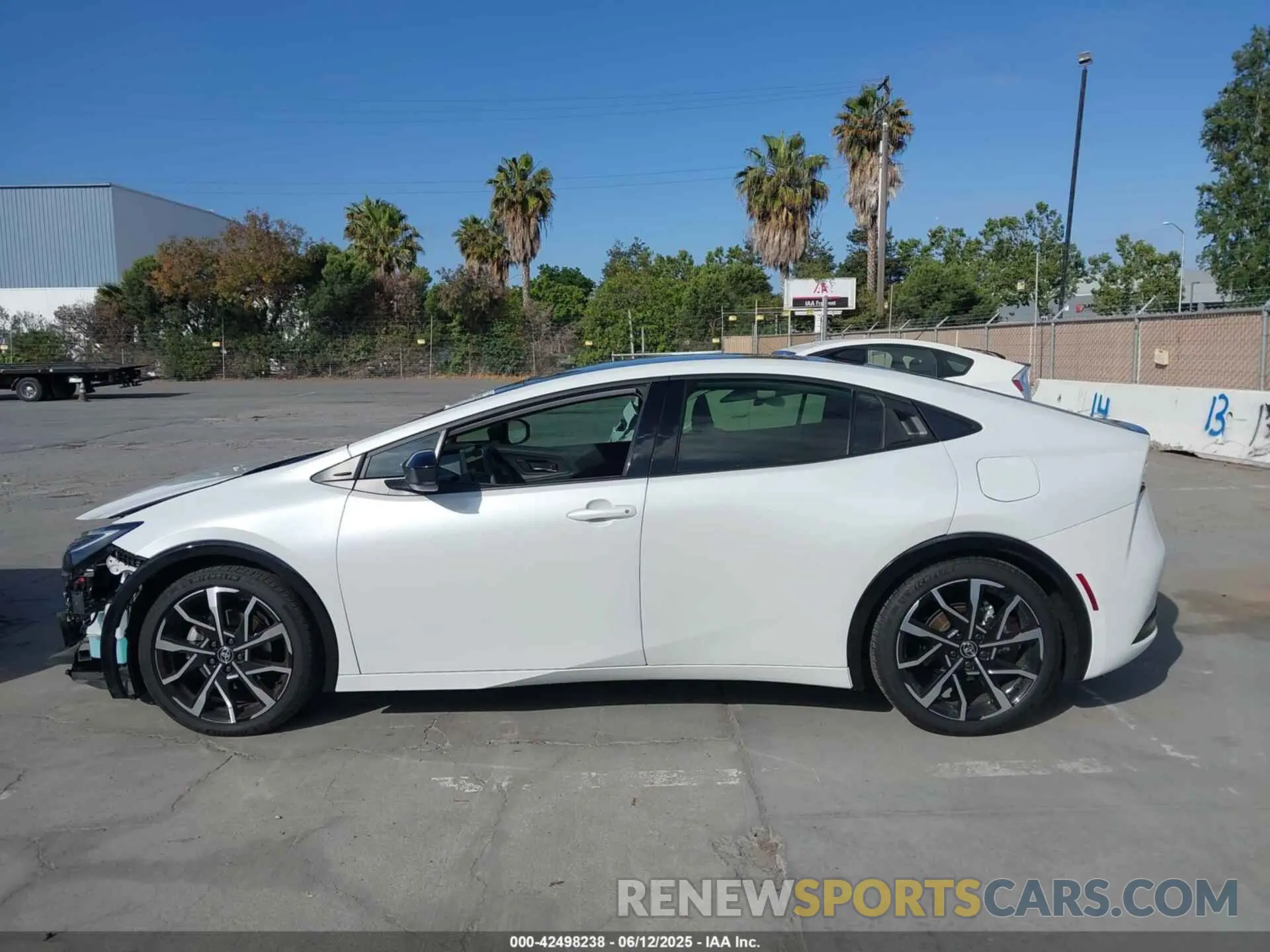 15 Photograph of a damaged car JTDACACU9R3023174 TOYOTA PRIUS PRIME 2024