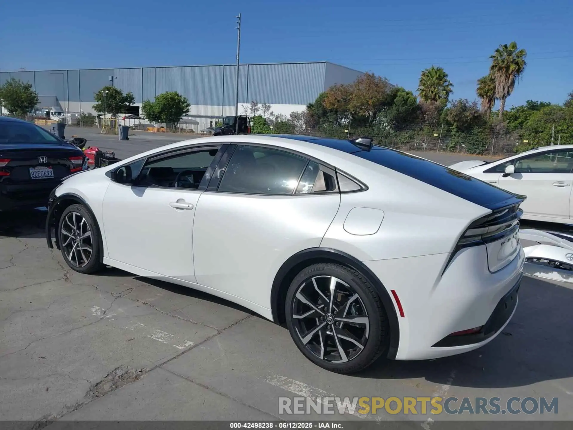 3 Photograph of a damaged car JTDACACU9R3023174 TOYOTA PRIUS PRIME 2024