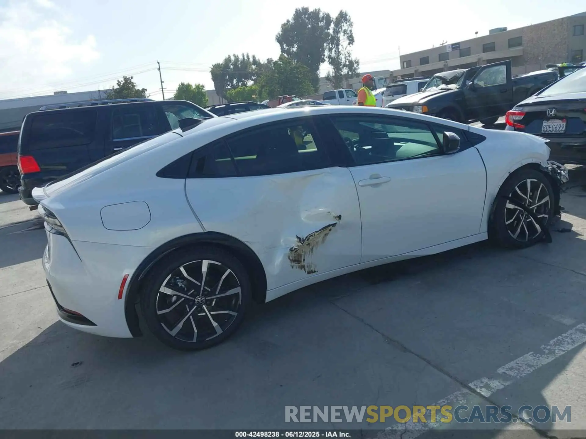 4 Photograph of a damaged car JTDACACU9R3023174 TOYOTA PRIUS PRIME 2024