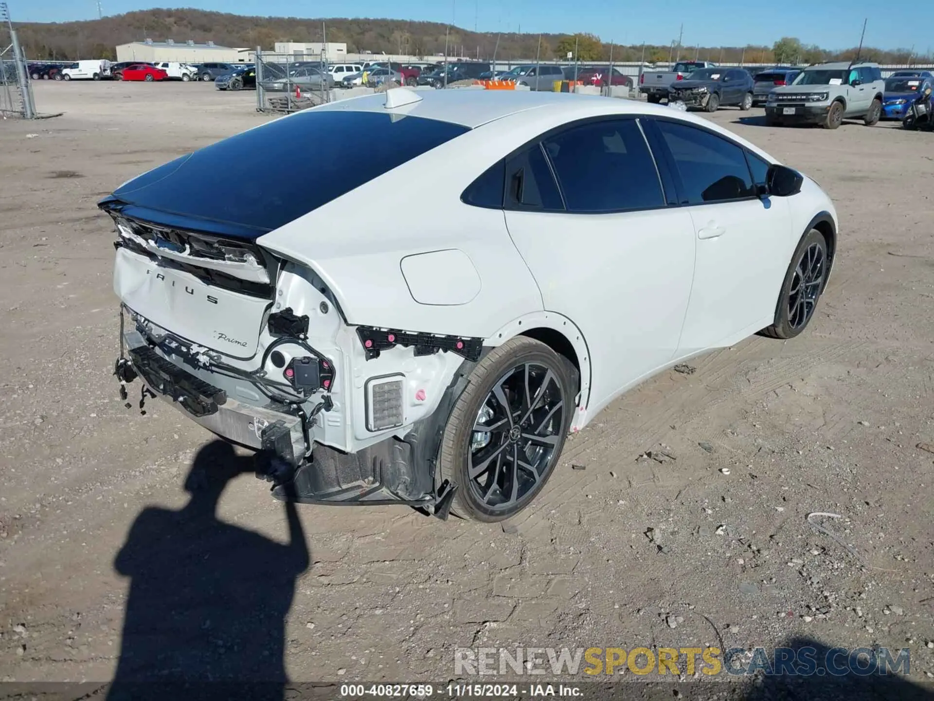 4 Photograph of a damaged car JTDACACU9R3026799 TOYOTA PRIUS PRIME 2024