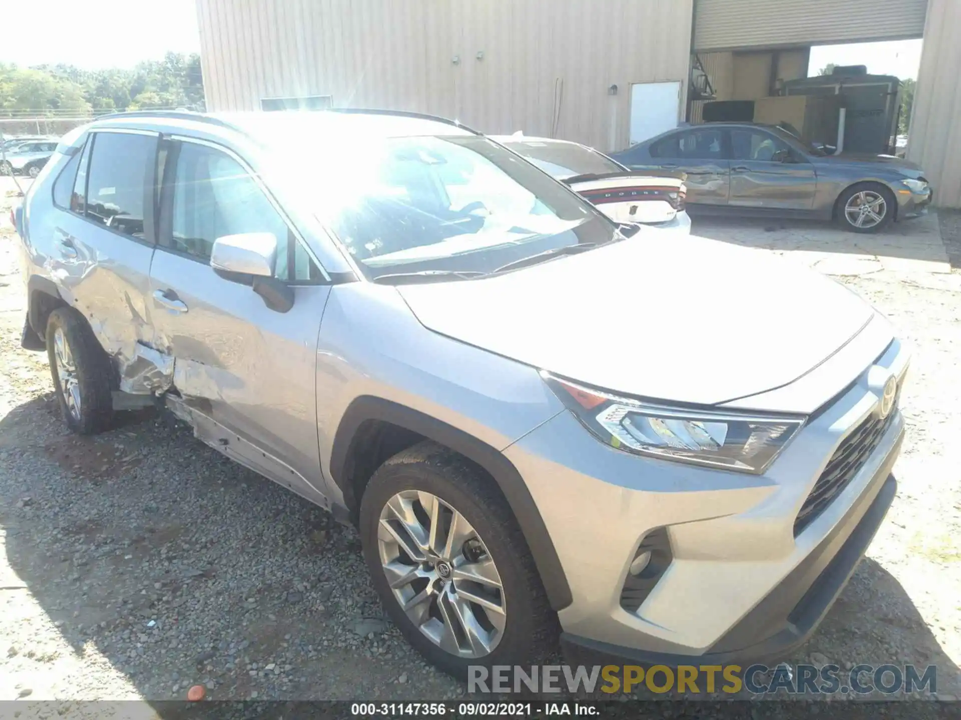 1 Photograph of a damaged car 2T3C1RFV5KW048383 TOYOTA RAV4 2019