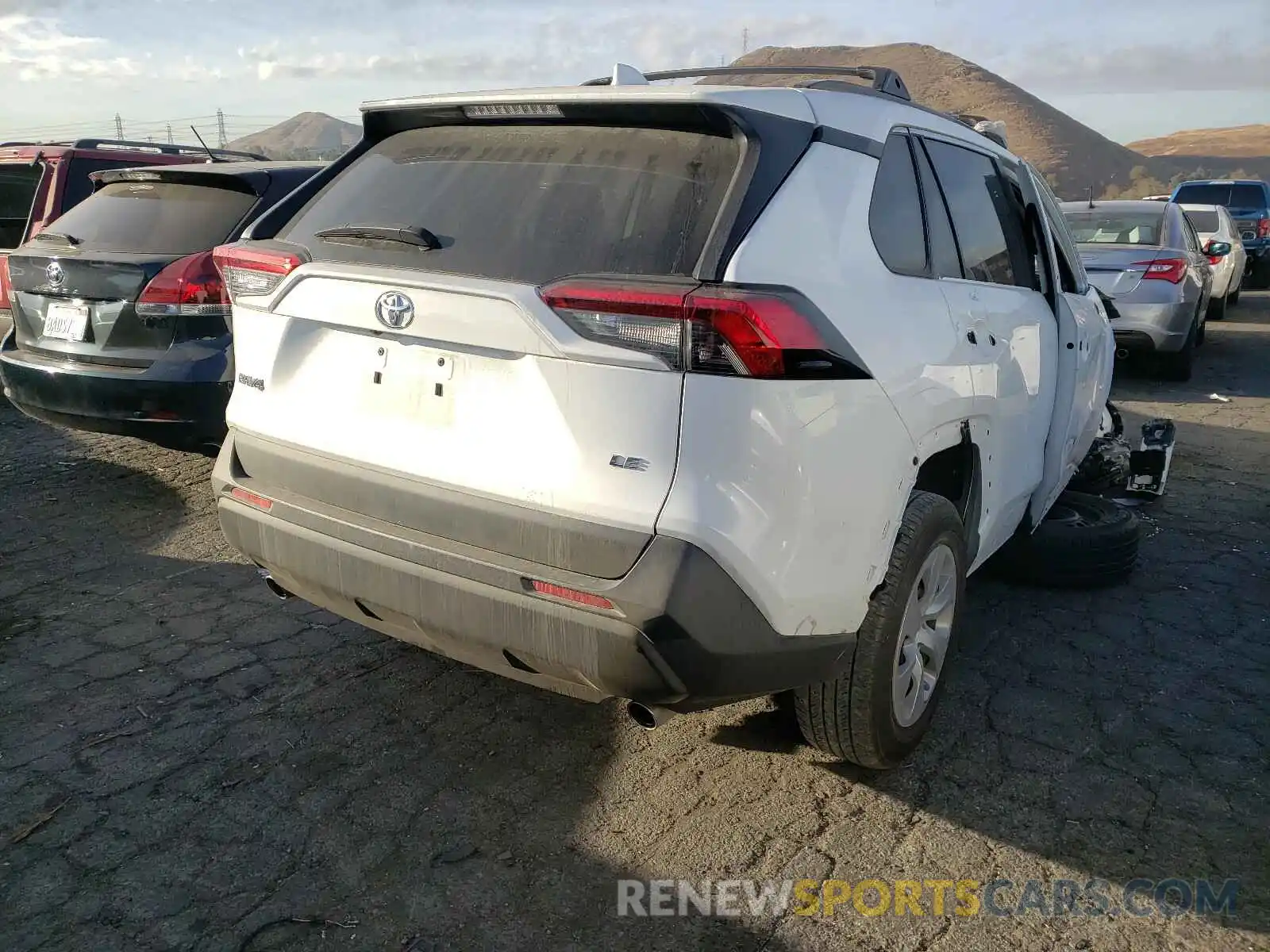 4 Photograph of a damaged car 2T3H1RFVXKC015306 TOYOTA RAV4 2019