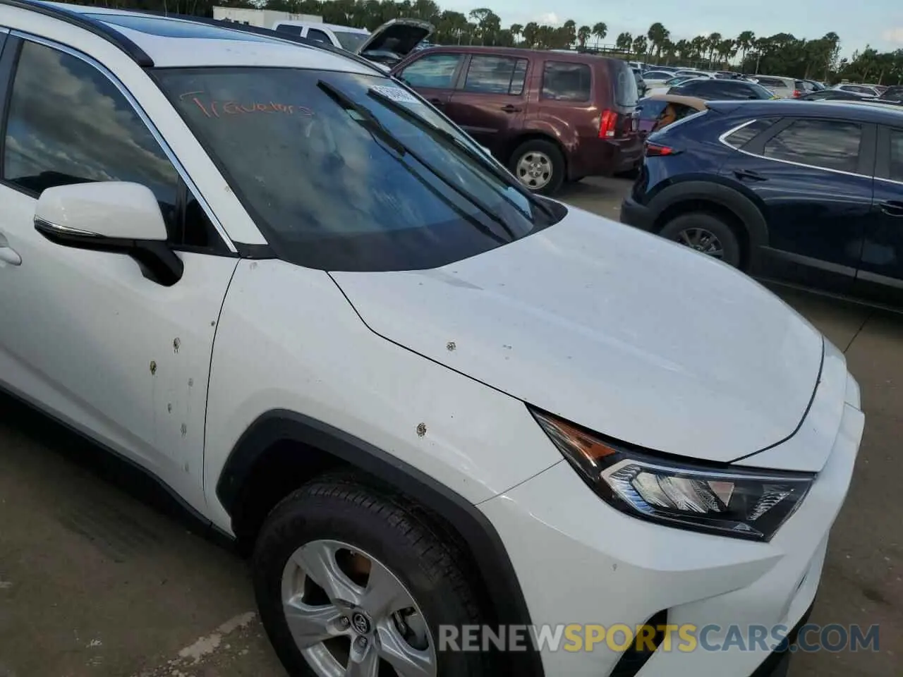 9 Photograph of a damaged car 2T3W1RFV0KC004449 TOYOTA RAV4 2019