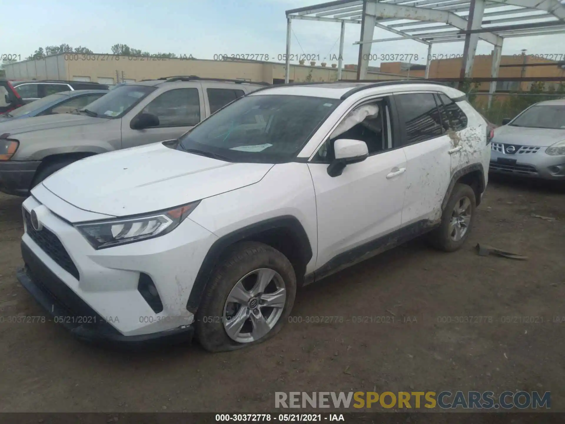 2 Photograph of a damaged car 2T3W1RFV0KC024944 TOYOTA RAV4 2019