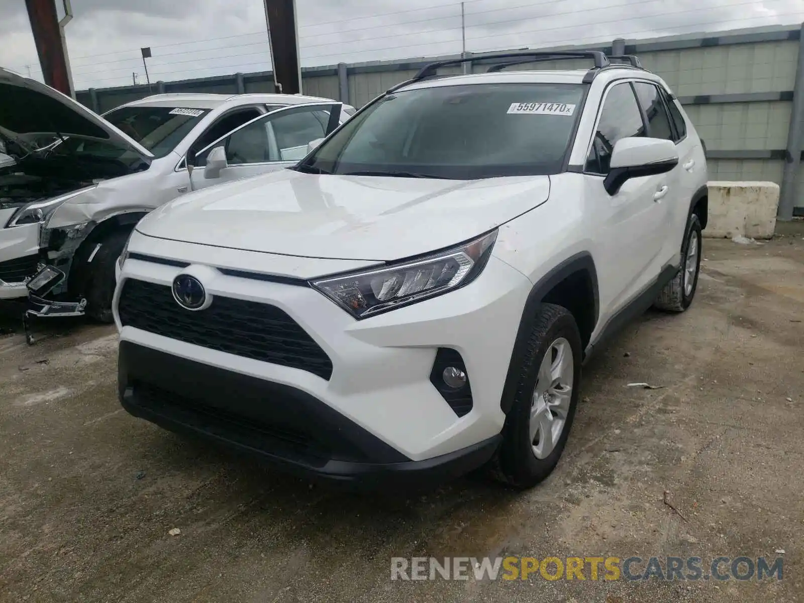 2 Photograph of a damaged car 2T3W1RFV0KC025379 TOYOTA RAV4 2019