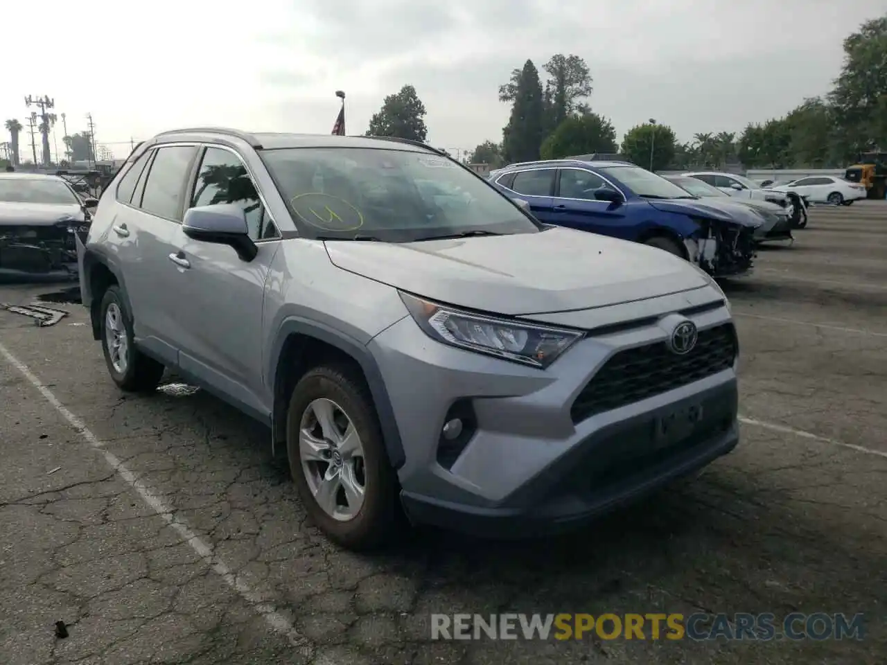 1 Photograph of a damaged car 2T3W1RFV0KW026031 TOYOTA RAV4 2019