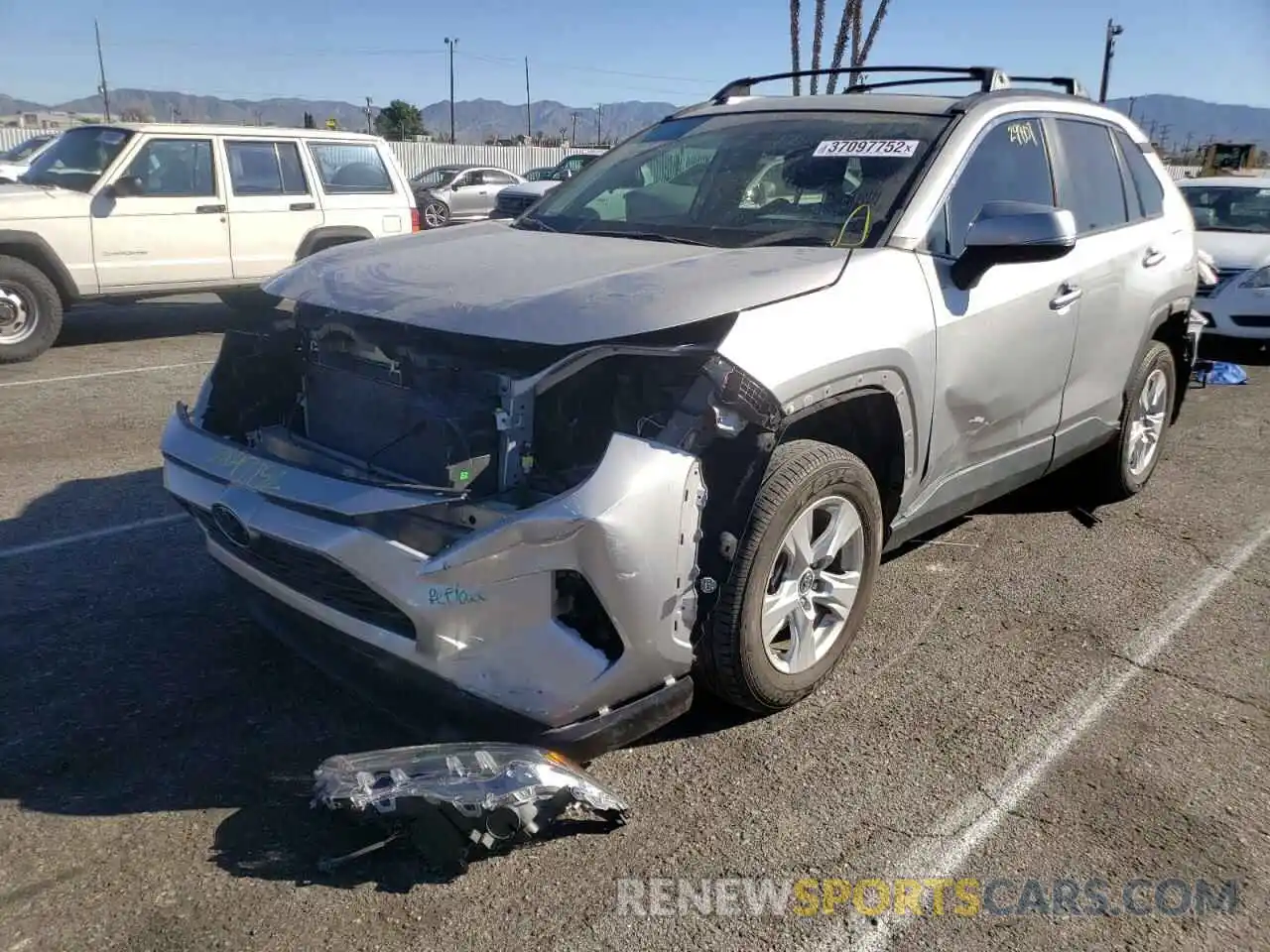 2 Photograph of a damaged car 2T3W1RFV3KC005126 TOYOTA RAV4 2019