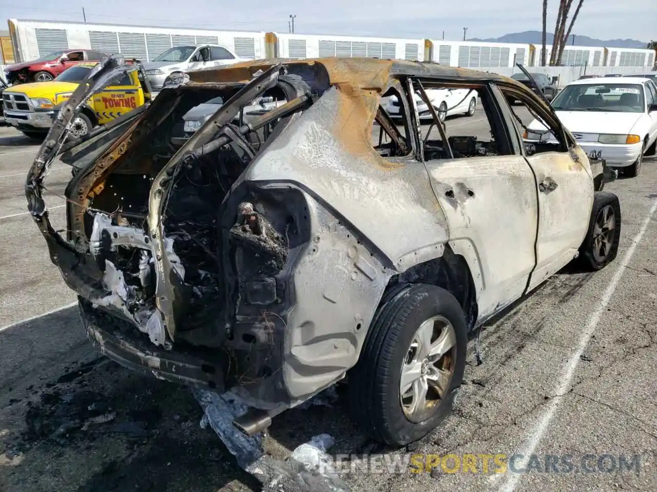 4 Photograph of a damaged car 2T3W1RFV4KC011369 TOYOTA RAV4 2019