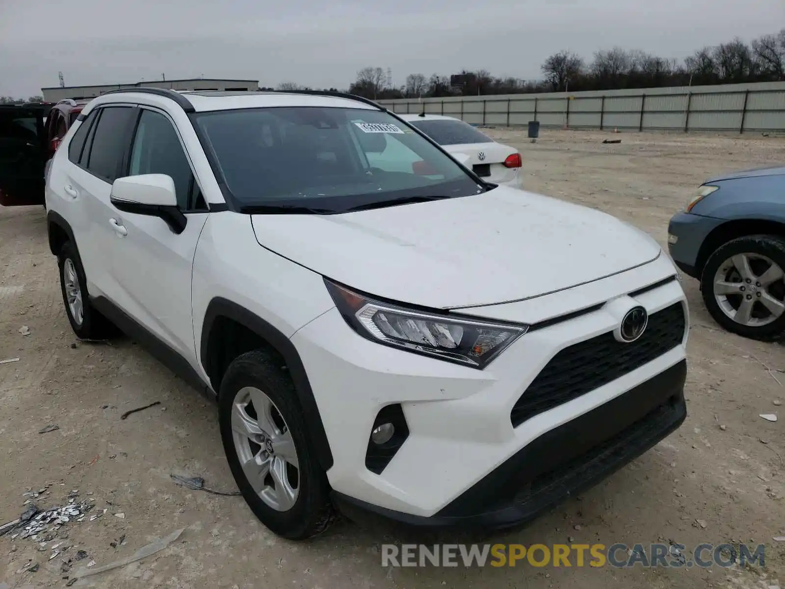 1 Photograph of a damaged car 2T3W1RFV5KW004056 TOYOTA RAV4 2019