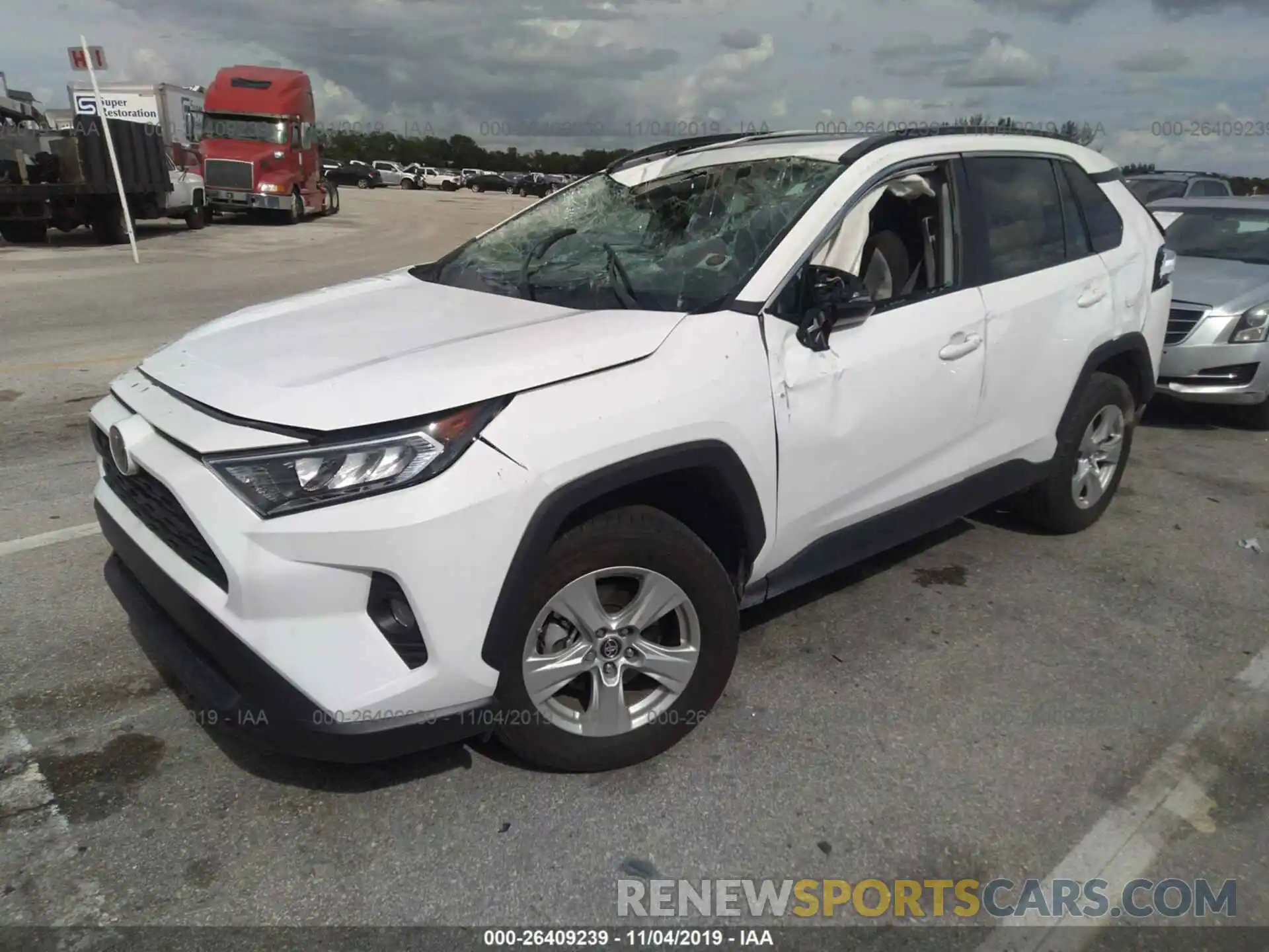 2 Photograph of a damaged car 2T3W1RFV7KW007458 TOYOTA RAV4 2019