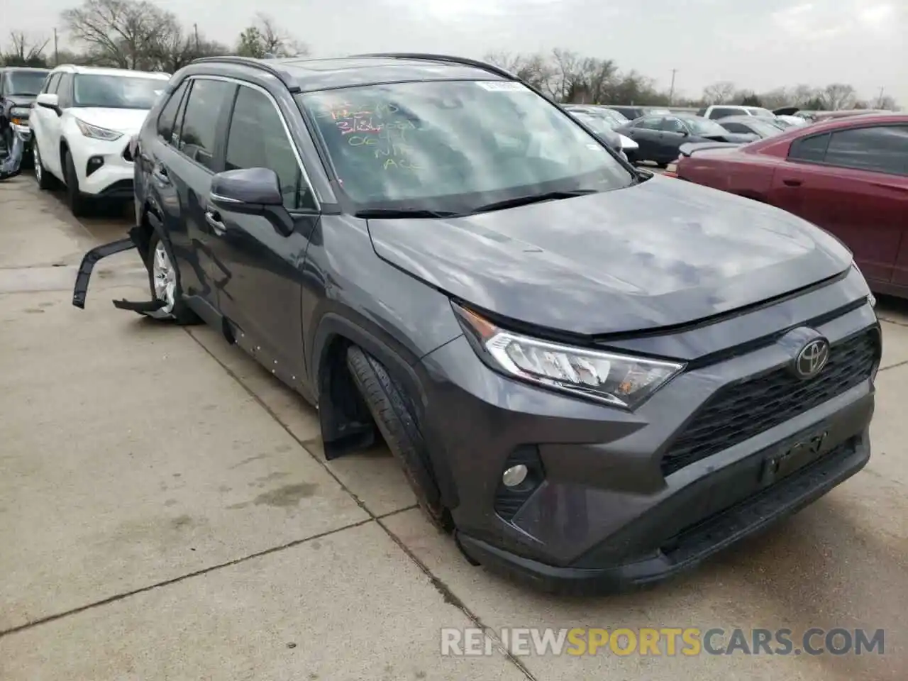 1 Photograph of a damaged car 2T3W1RFVXKC021551 TOYOTA RAV4 2019