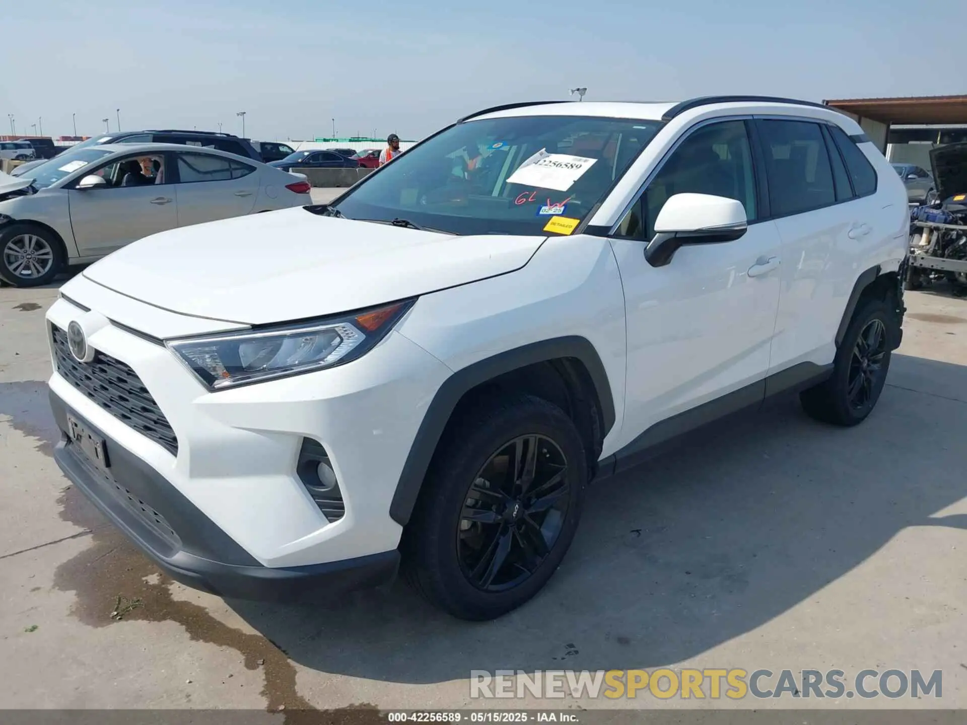 2 Photograph of a damaged car 2T3W1RFVXKW009348 TOYOTA RAV4 2019
