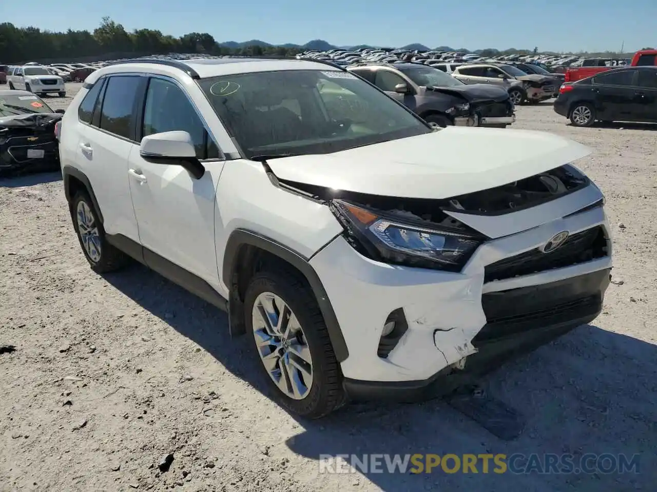 1 Photograph of a damaged car JTMA1RFV0KD006997 TOYOTA RAV4 2019