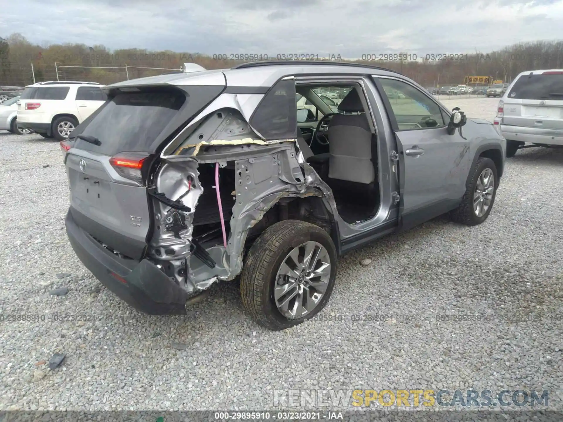 4 Photograph of a damaged car JTMA1RFV1KD014266 TOYOTA RAV4 2019