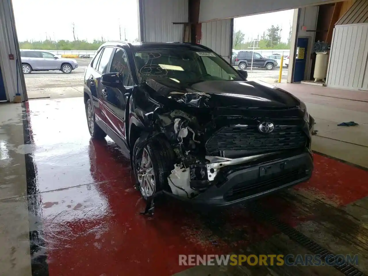 1 Photograph of a damaged car JTMA1RFV1KD031035 TOYOTA RAV4 2019