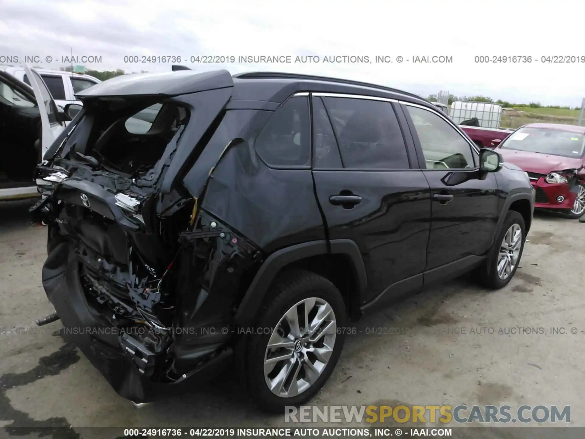 4 Photograph of a damaged car JTMA1RFV1KD500849 TOYOTA RAV4 2019