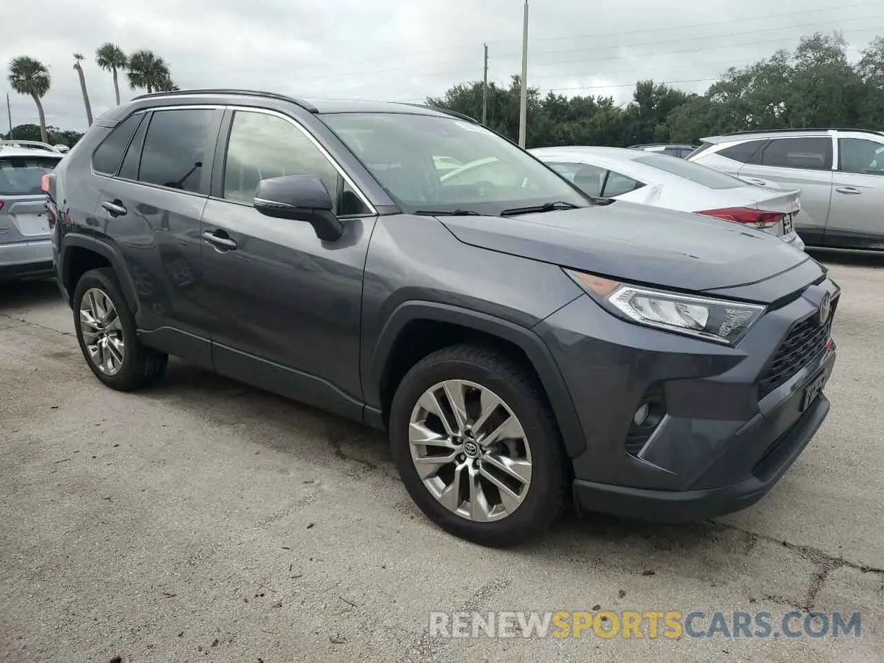 4 Photograph of a damaged car JTMA1RFV2KD005978 TOYOTA RAV4 2019