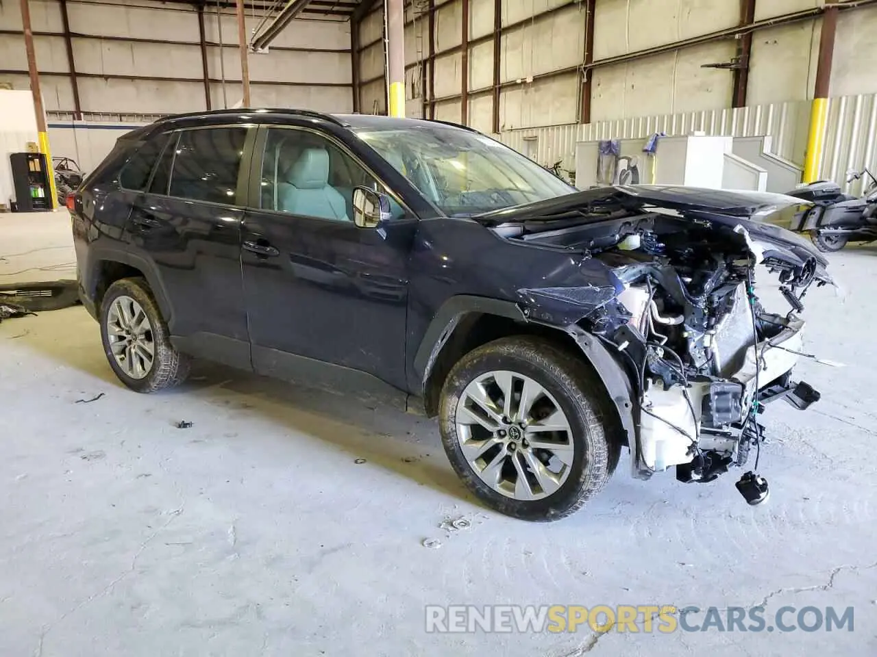 4 Photograph of a damaged car JTMA1RFV2KD033361 TOYOTA RAV4 2019