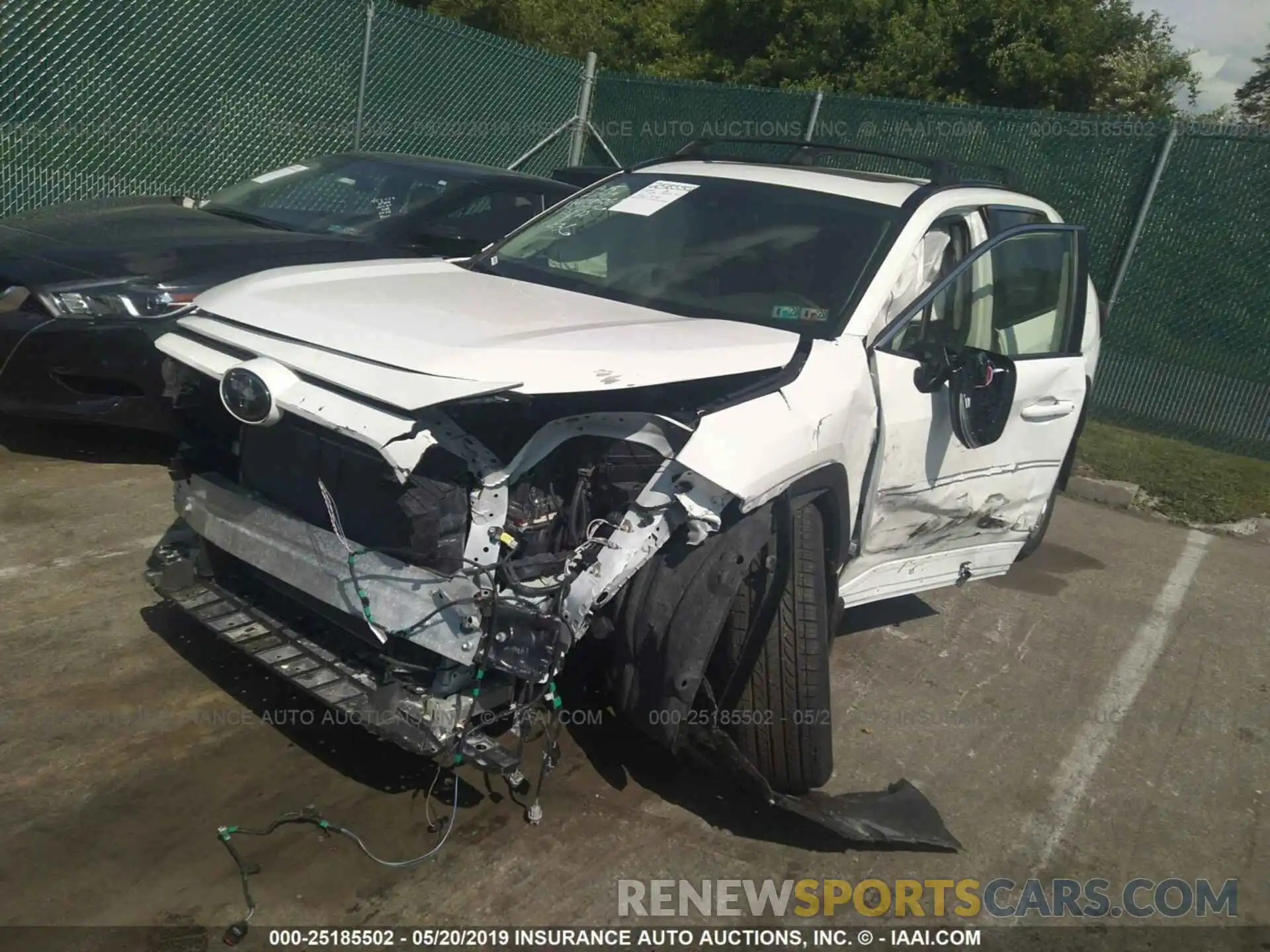 2 Photograph of a damaged car JTMA1RFV2KJ013497 TOYOTA RAV4 2019