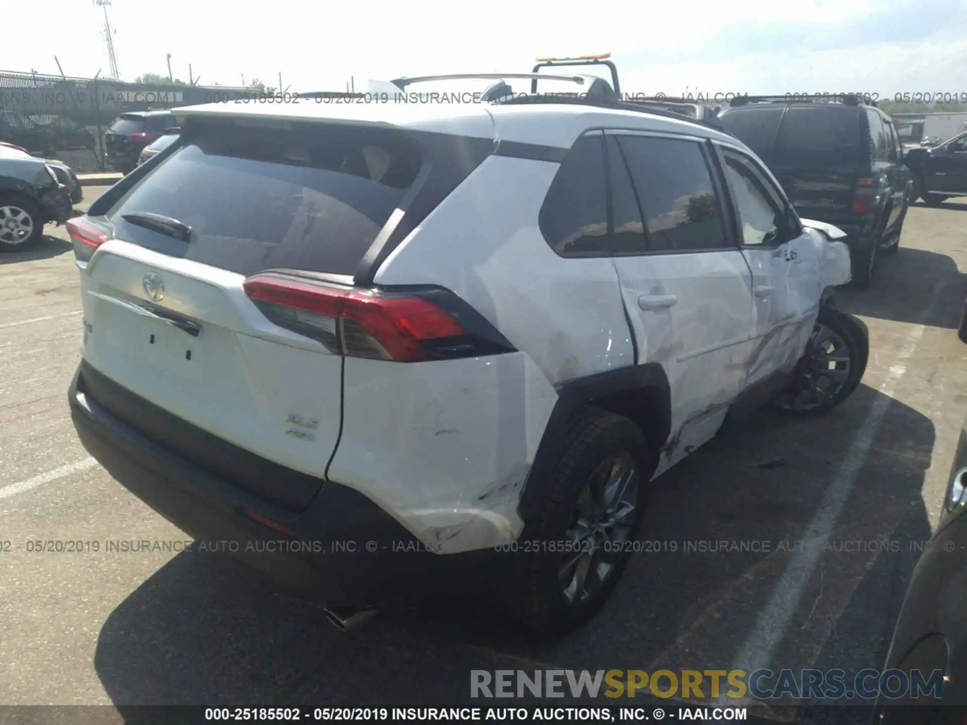 4 Photograph of a damaged car JTMA1RFV2KJ013497 TOYOTA RAV4 2019