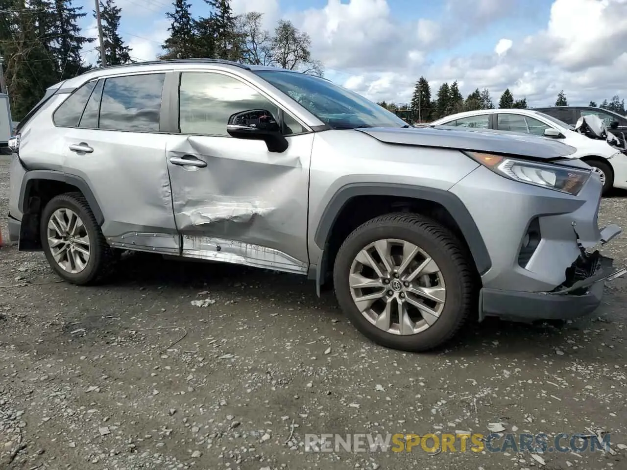 4 Photograph of a damaged car JTMA1RFV3KD504742 TOYOTA RAV4 2019
