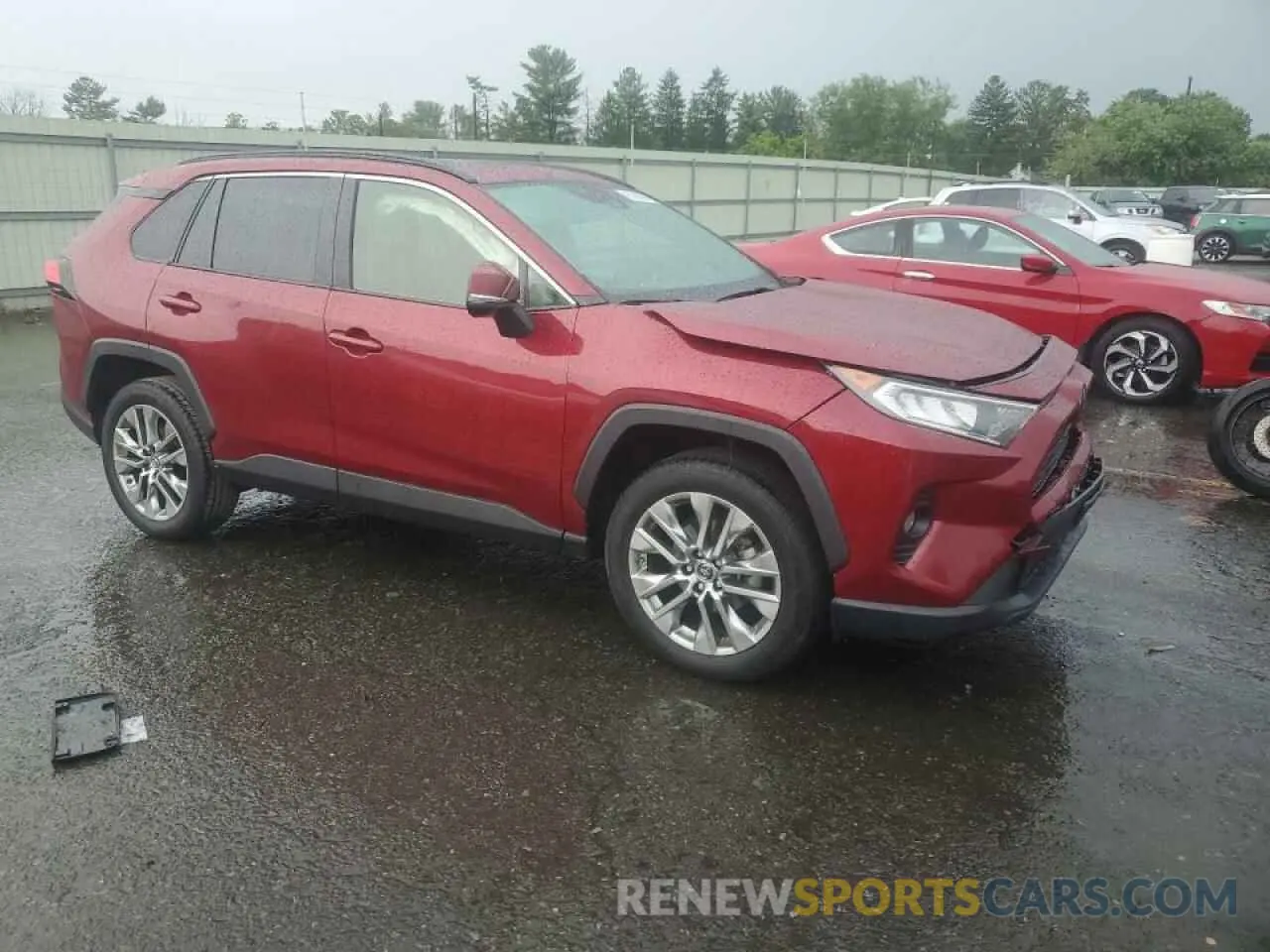 4 Photograph of a damaged car JTMA1RFV3KD514588 TOYOTA RAV4 2019