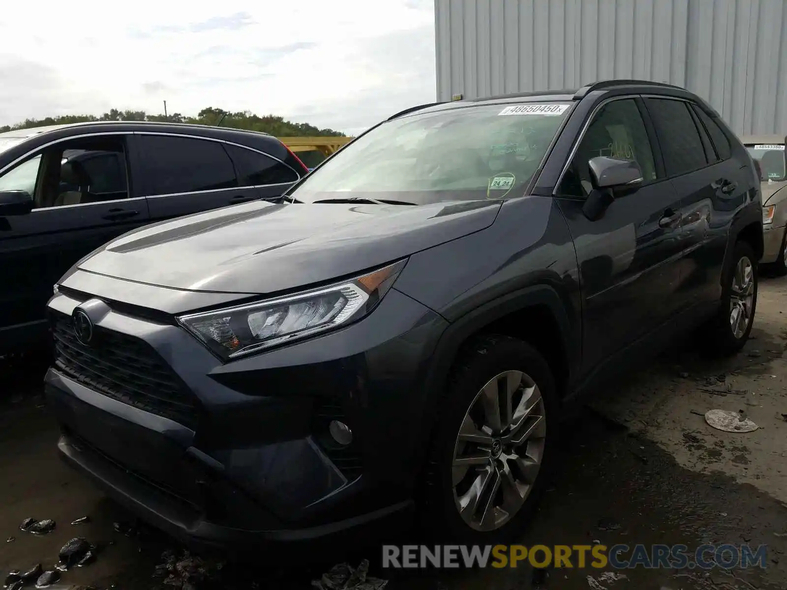 2 Photograph of a damaged car JTMA1RFV3KD515028 TOYOTA RAV4 2019