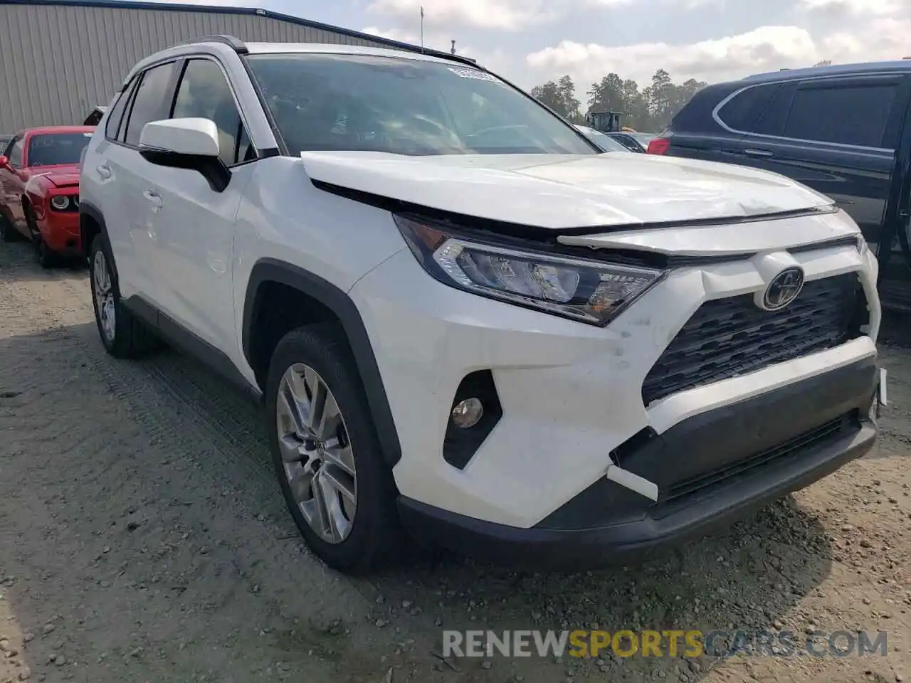 1 Photograph of a damaged car JTMA1RFV3KD522318 TOYOTA RAV4 2019