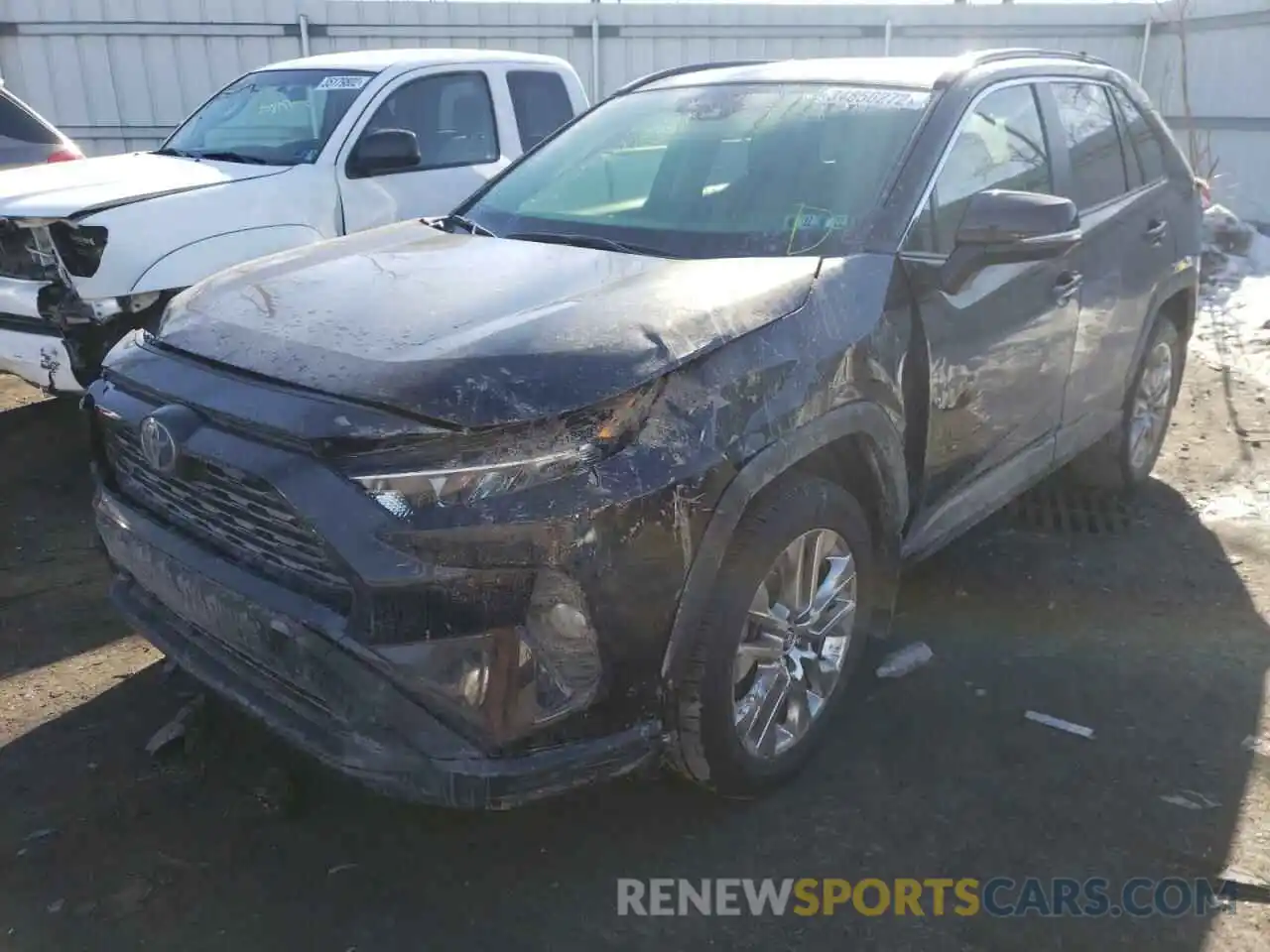 2 Photograph of a damaged car JTMA1RFV4KJ017454 TOYOTA RAV4 2019