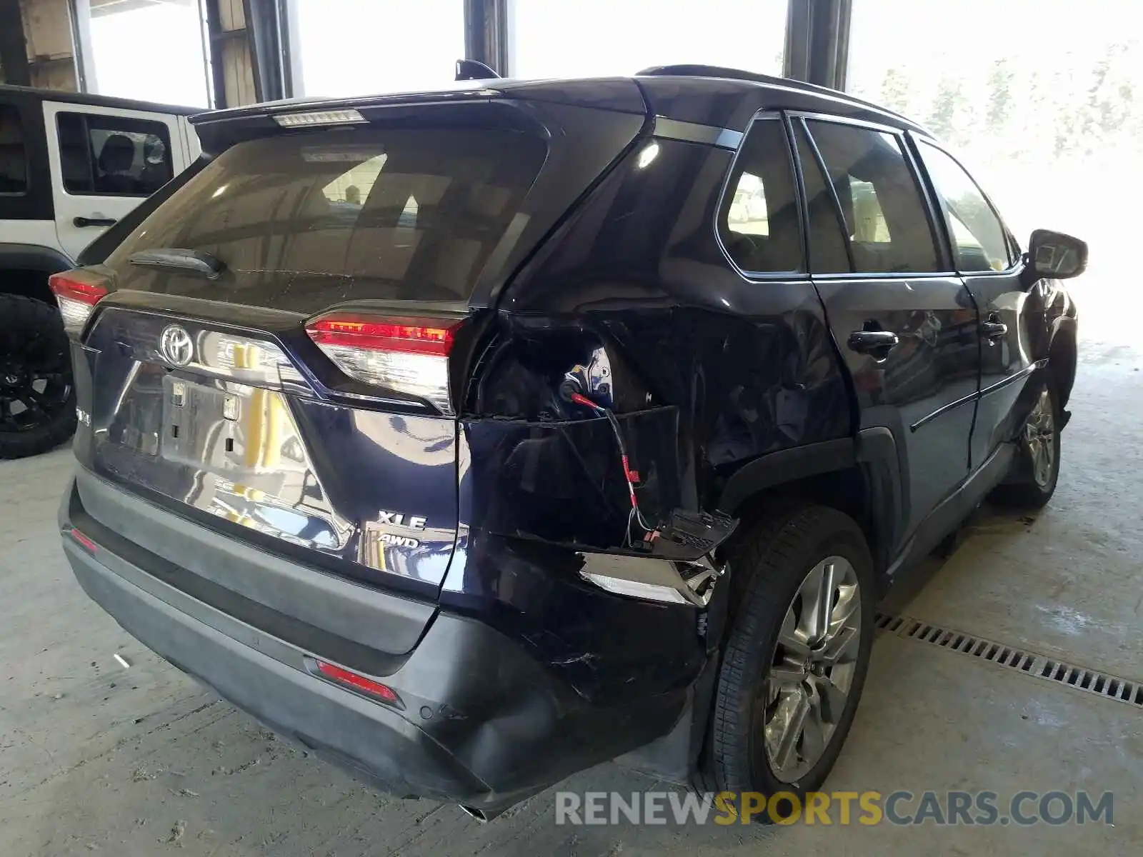 4 Photograph of a damaged car JTMA1RFV5KD024878 TOYOTA RAV4 2019