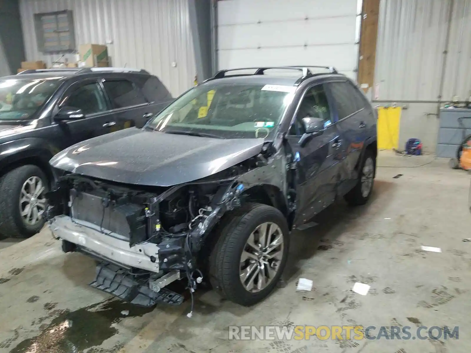 2 Photograph of a damaged car JTMA1RFV5KJ008911 TOYOTA RAV4 2019