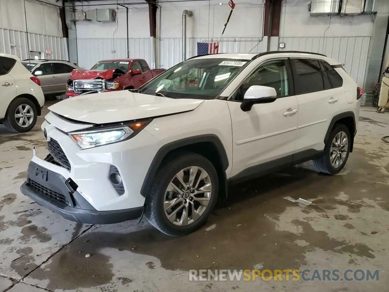 1 Photograph of a damaged car JTMA1RFV6KD016871 TOYOTA RAV4 2019