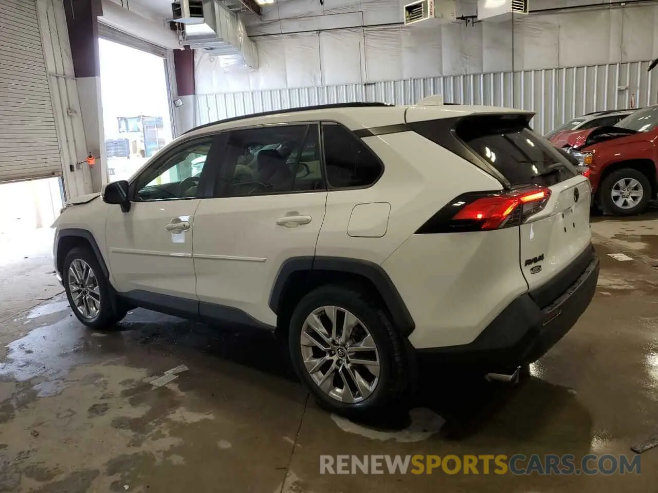 2 Photograph of a damaged car JTMA1RFV6KD016871 TOYOTA RAV4 2019