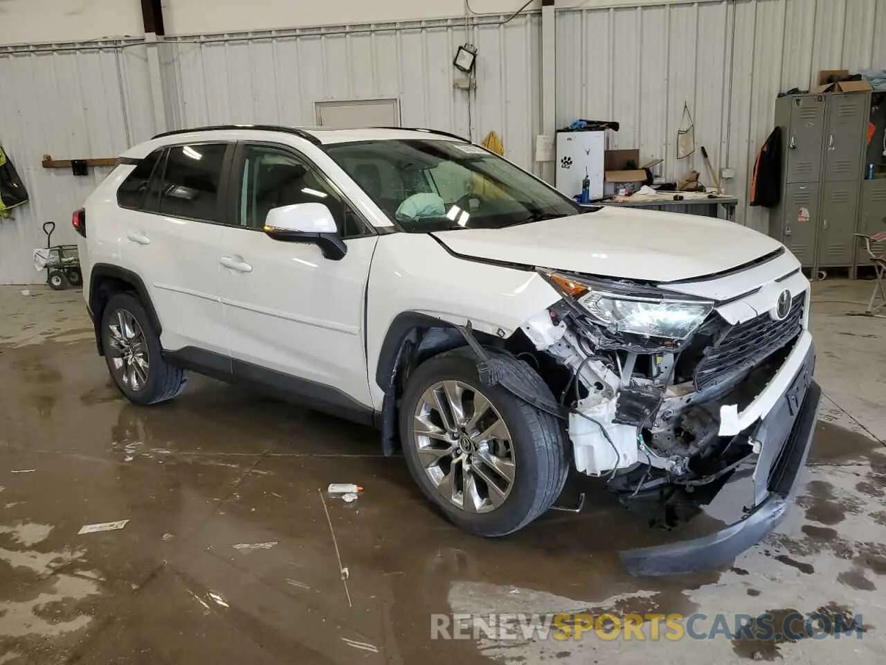 4 Photograph of a damaged car JTMA1RFV6KD016871 TOYOTA RAV4 2019