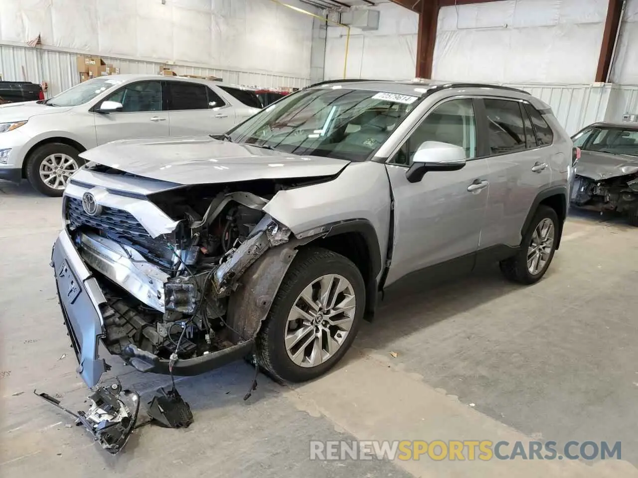 1 Photograph of a damaged car JTMA1RFV6KD043827 TOYOTA RAV4 2019