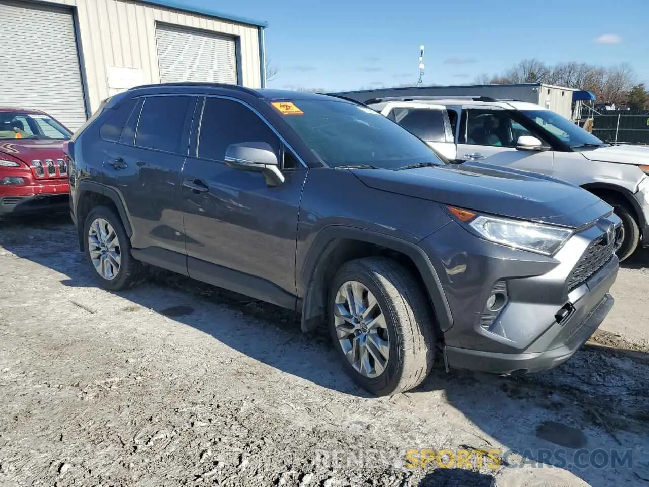 4 Photograph of a damaged car JTMA1RFV7KD028589 TOYOTA RAV4 2019