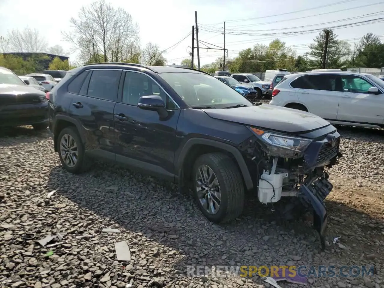 4 Photograph of a damaged car JTMA1RFV7KJ004164 TOYOTA RAV4 2019