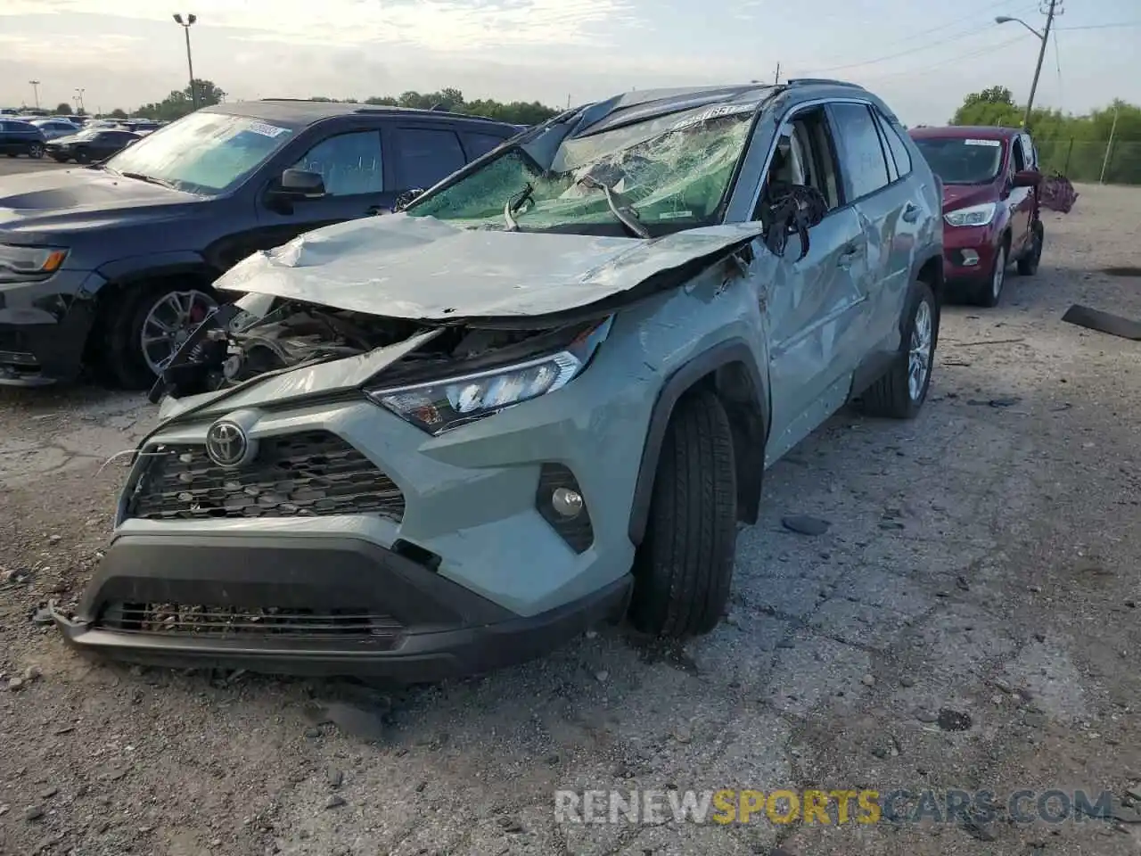 2 Photograph of a damaged car JTMA1RFV8KD506731 TOYOTA RAV4 2019