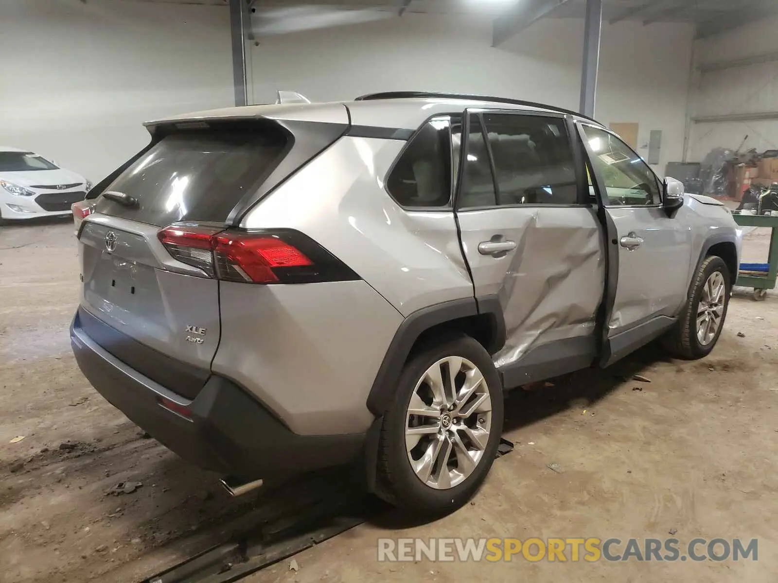 4 Photograph of a damaged car JTMA1RFV9KD046933 TOYOTA RAV4 2019